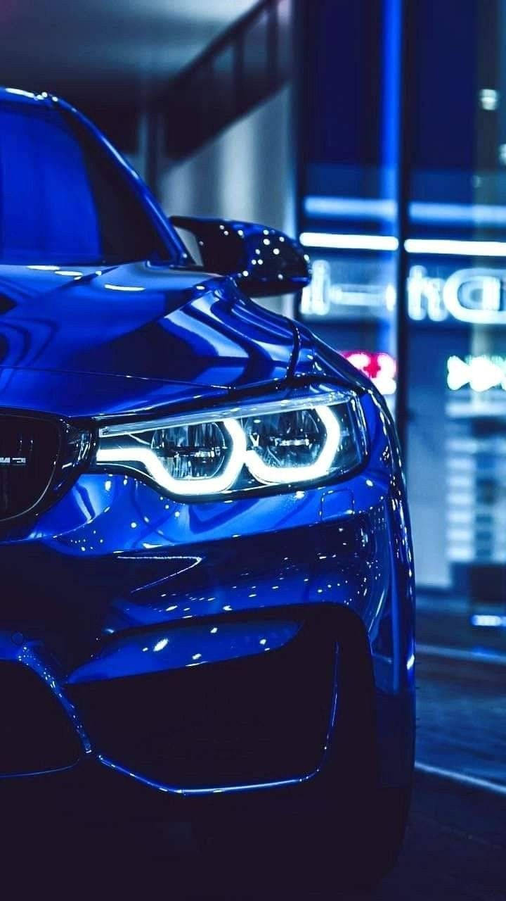 নীল BMW এর জ্বলজ্বলে হেডলাইট ওয়ালপেপার