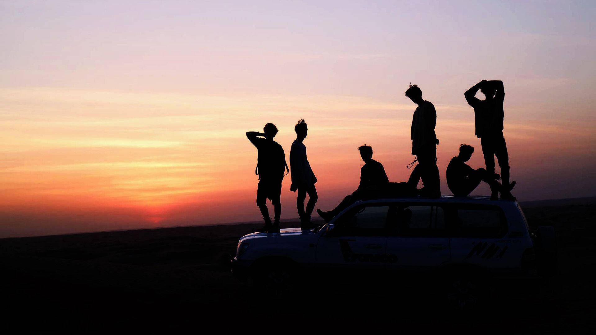 BTS গ্রুপ ফটো সূর্যাস্ত ওয়ালপেপার
