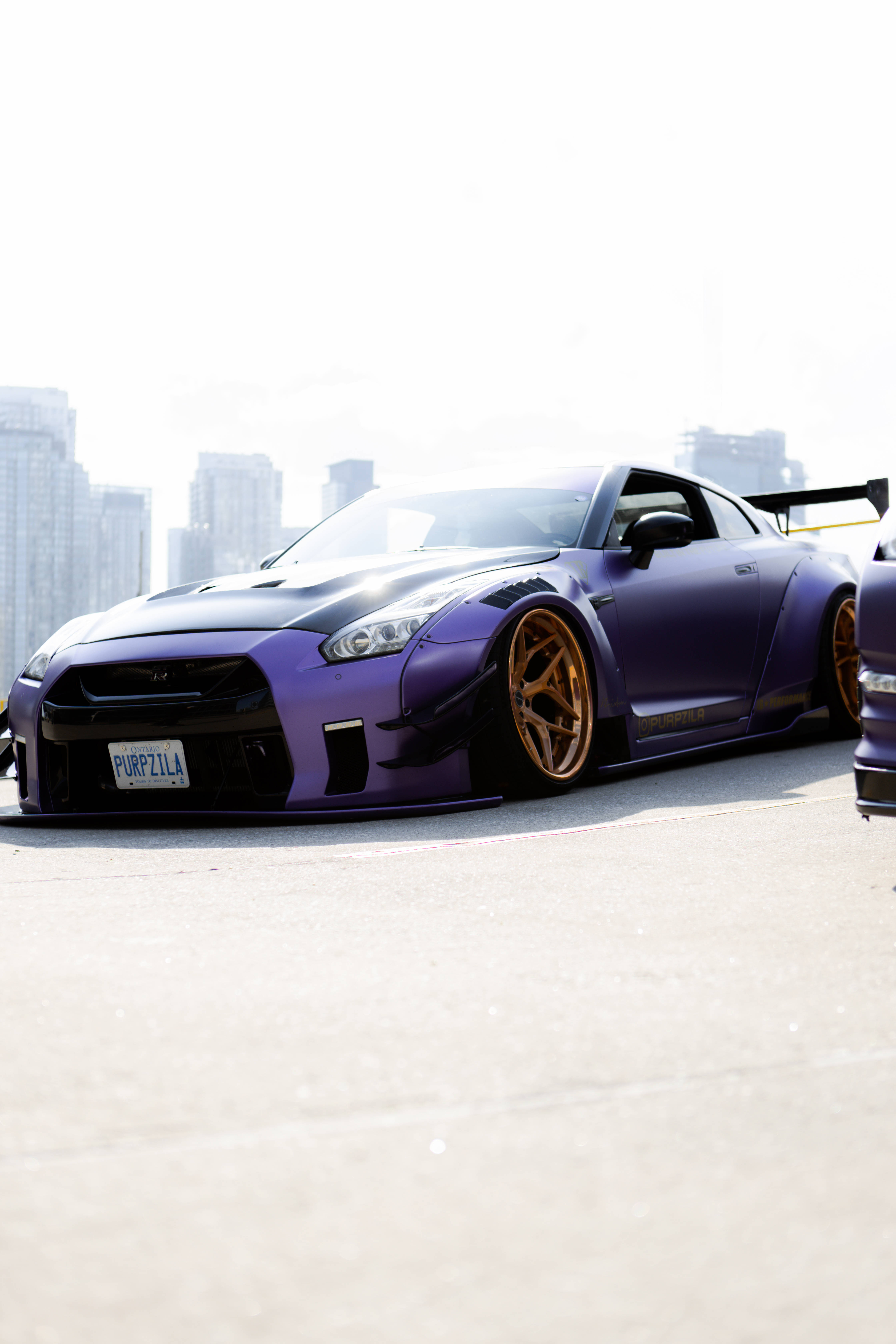 বেগুনি নিসান স্কাইলাইন GTR R34 ওয়ালপেপার