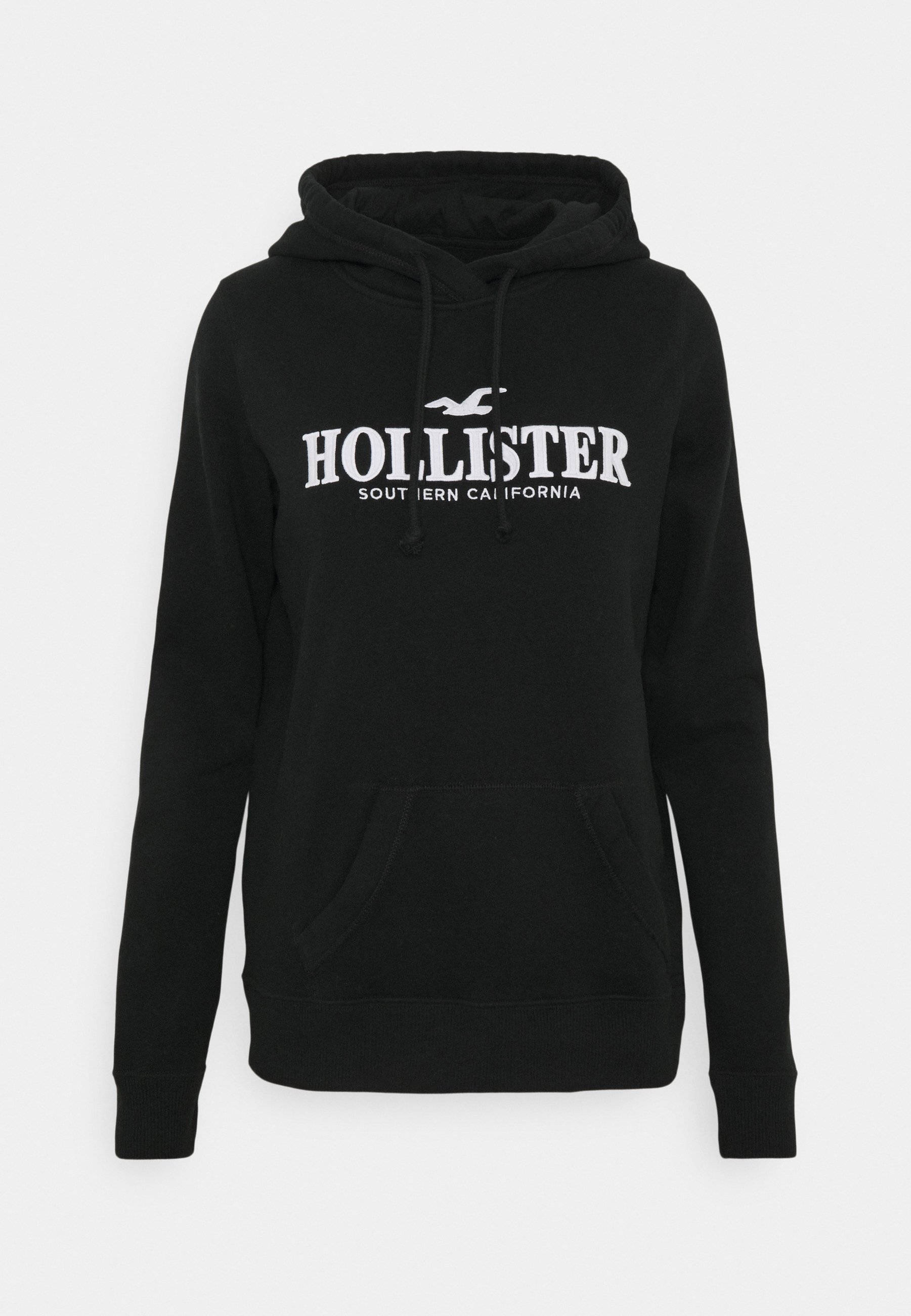Hollister-এর কালো হুডি জ্যাকেট দিয়ে আপনার স্ট্রিট স্টাইল প্রকাশ করুন ওয়ালপেপার