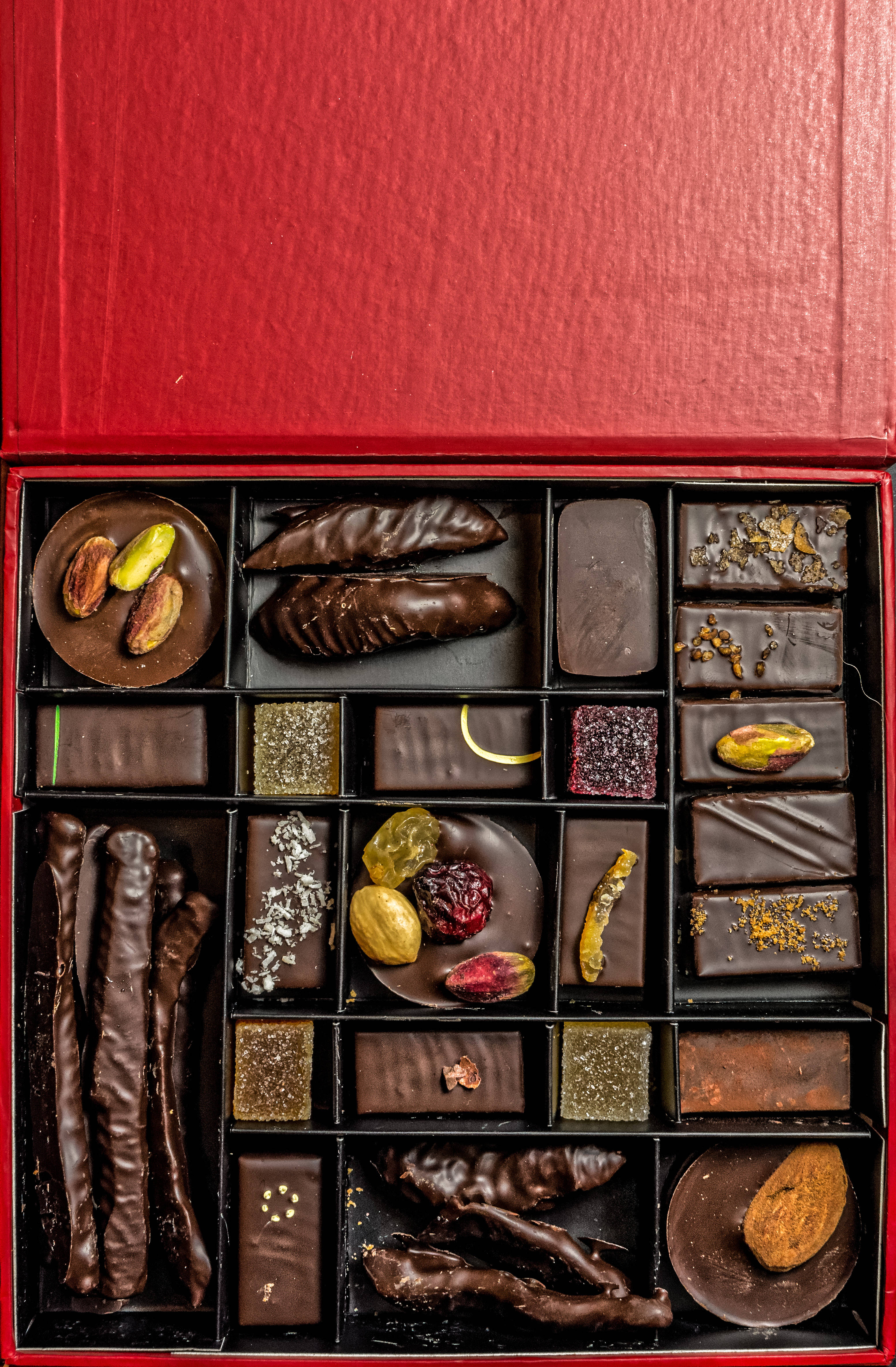 Luxurious Chocolates Wrapped in a Red Box ওয়ালপেপার