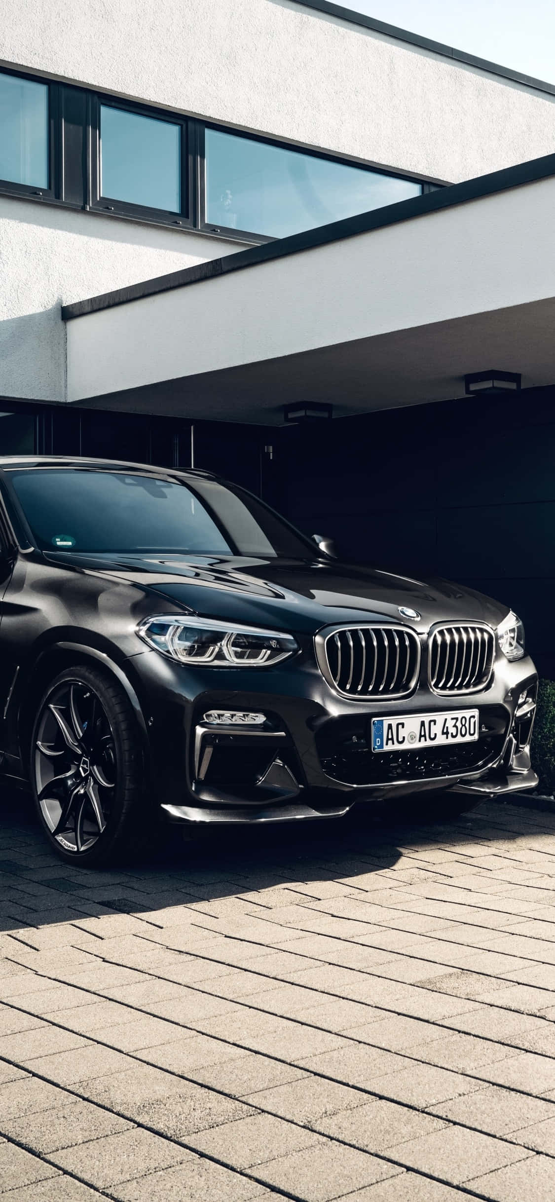 আপনার BMW-এ একটি সুন্দর ড্রাইভ, iPhone X দ্বারা চালিত ওয়ালপেপার