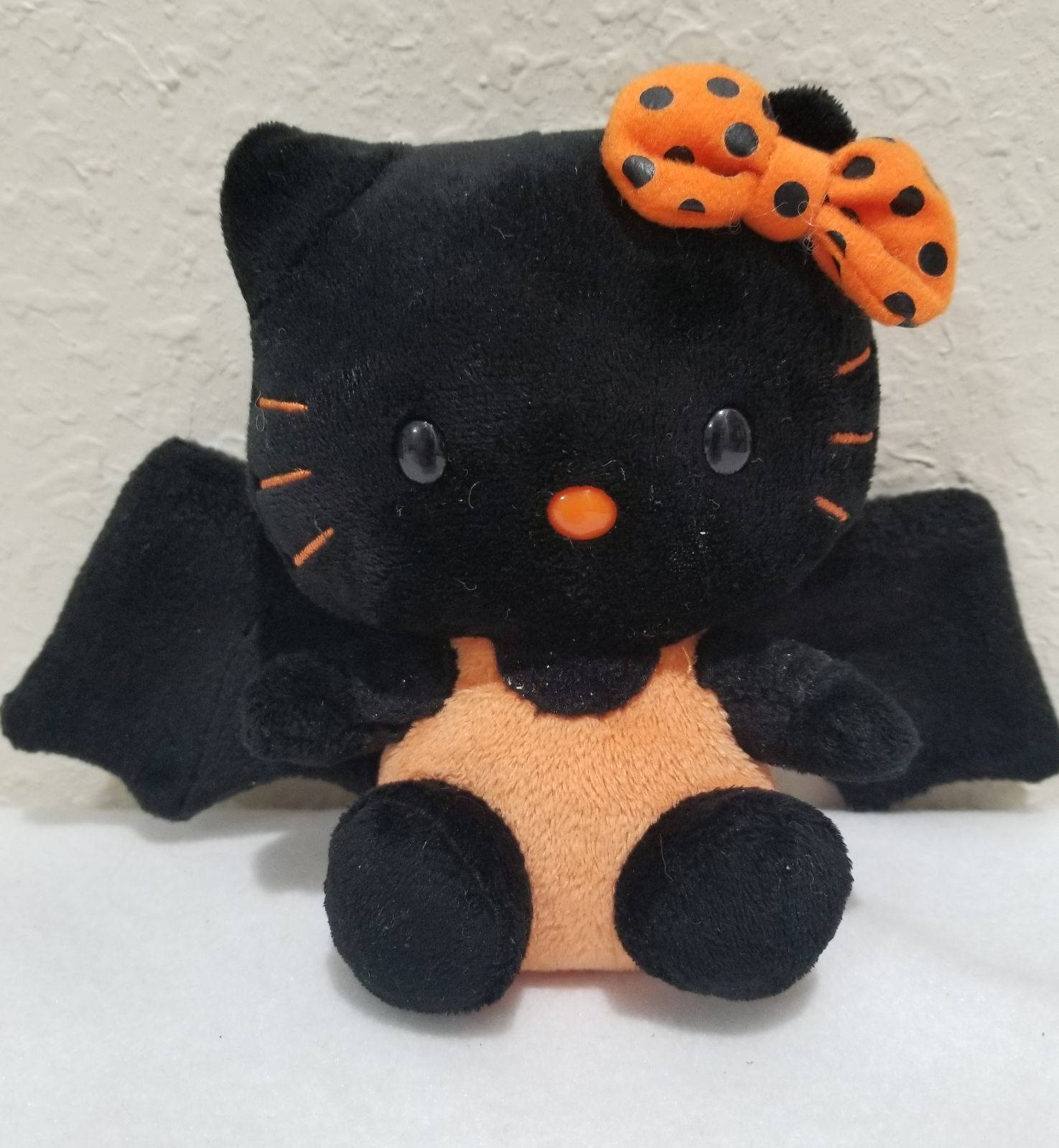 কমলা-কালো ব্যাট হ্যালো কিটি হ্যালোইন ওয়ালপেপার