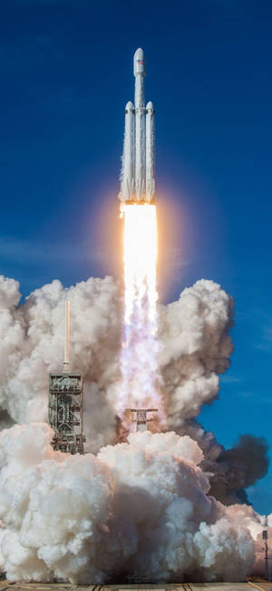SpaceX Falcon Heavy উৎক্ষেপণ ওয়ালপেপার — আইফোন ১৮ প্রো ওয়ালপেপার